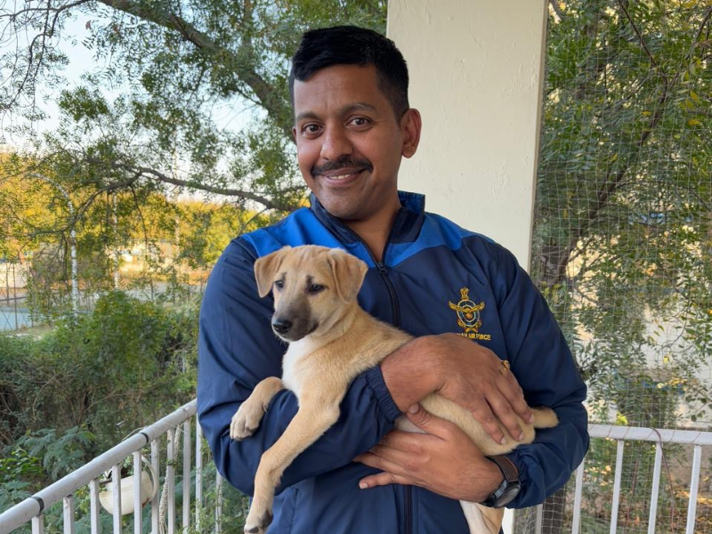 Woman with adopted puppy